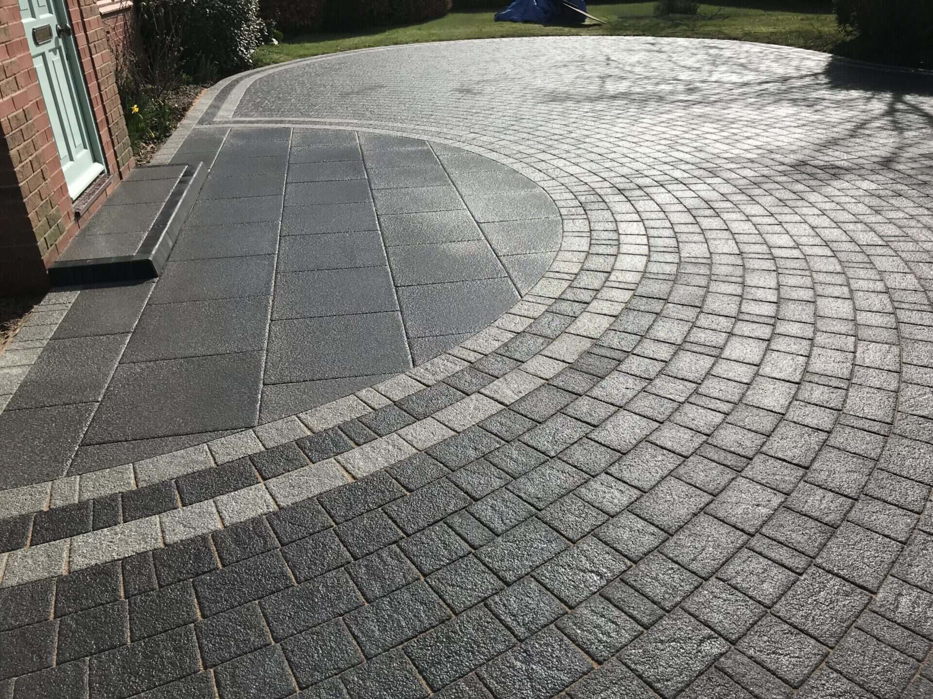 block paving driveway, designed to draw attention to the front of a residential property